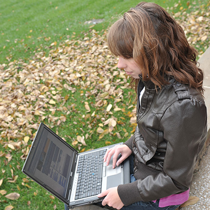 female working on a laptop